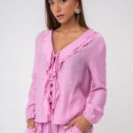 Sleeved top with ruffles on the chest